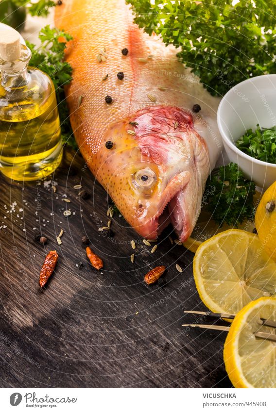 Whole rainbow trout, spices, lemon and oil. Food Fish Vegetable Fruit Herbs and spices Cooking oil Nutrition Lunch Dinner Organic produce Vegetarian diet Diet