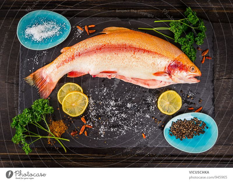 Whole rainbow trout fish with spices Food Fish Vegetable Herbs and spices Nutrition Lunch Dinner Banquet Organic produce Vegetarian diet Diet Plate Bowl