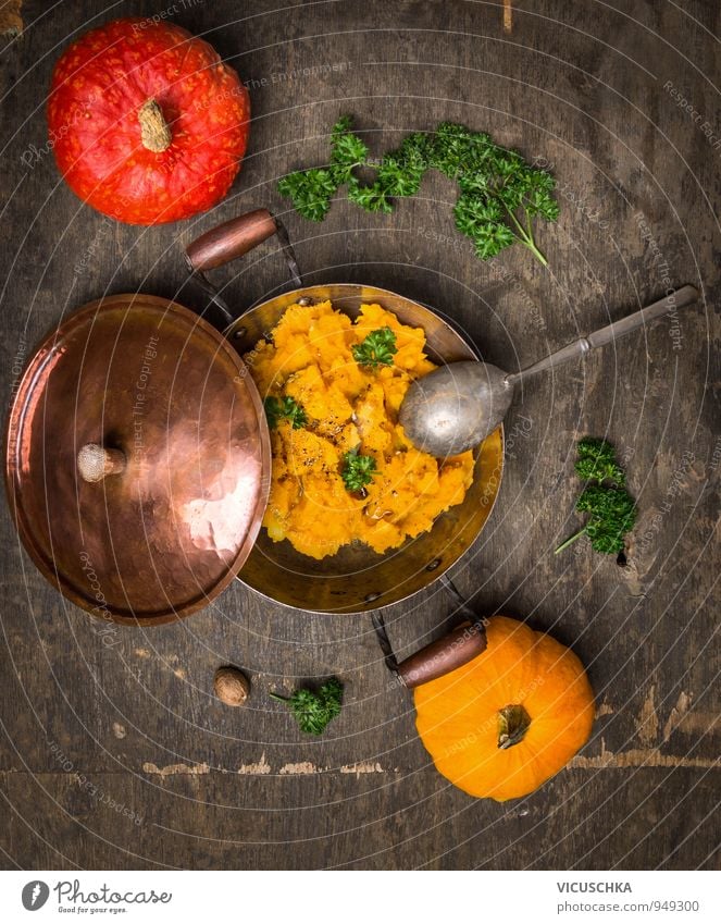 pumpkin puree in old pot with red and yellow pumpkin Food Vegetable Soup Stew Herbs and spices Nutrition Lunch Organic produce Vegetarian diet Diet Pot Spoon