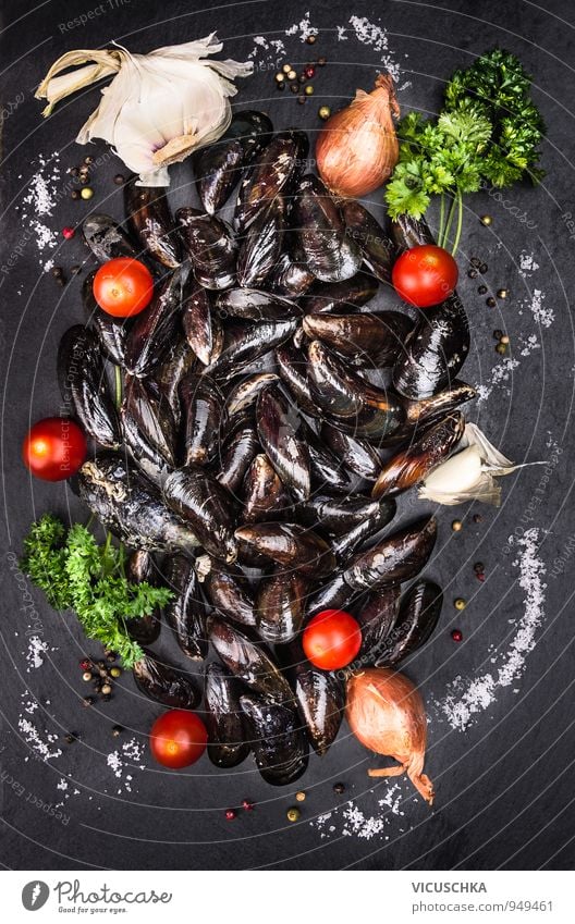 Raw mussels with tomatoes and spices on slate Food Seafood Vegetable Herbs and spices Nutrition Lunch Dinner Banquet Life Human being Nature Sand Design Gourmet