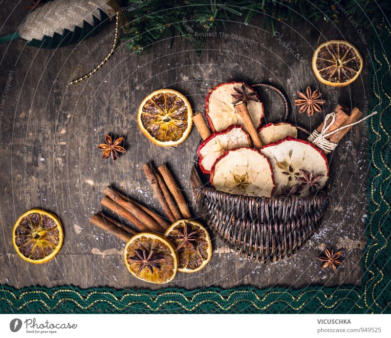 Dried fruit with cinnamon sticks and aniseed stars in basket Dessert Lifestyle Design Leisure and hobbies Winter Christmas & Advent Tradition Star aniseed