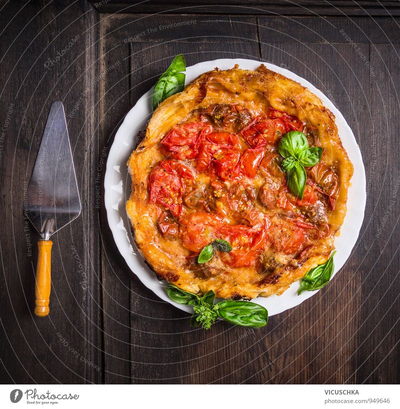 Tomato tart tatin. Food Vegetable Dough Baked goods Herbs and spices Nutrition Lunch Banquet Organic produce Vegetarian diet Diet Crockery Plate Lifestyle Style