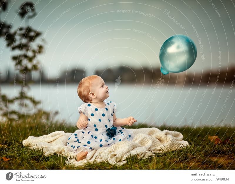 Girl at the lake Feminine Baby Toddler Infancy 0 - 12 months 1 - 3 years Horizon Meadow Lake Clothing Balloon Observe Glittering Looking Sit Happiness Happy