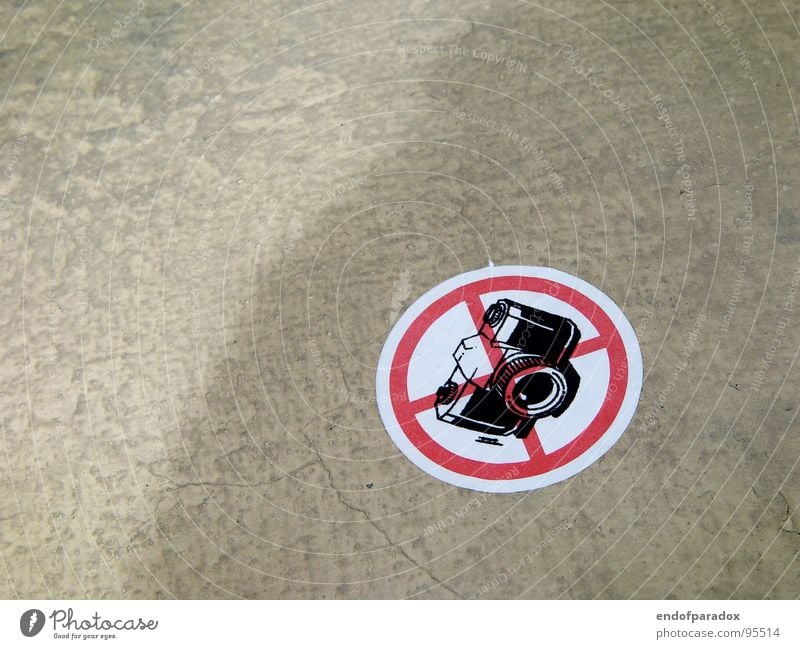 punishable Label Illogical Bans Concrete Gray Strange Warning label Warning sign warning prohibition forbit camera ground street grey confusing photography
