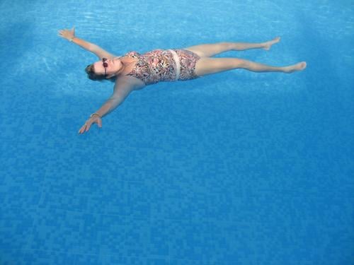 Dead in pool I Summer Swimming pool Vacation & Travel Ocean Swimsuit Bathroom Sunglasses Air Sunbathing Fat Woman Outstretched Wet Relaxation Water