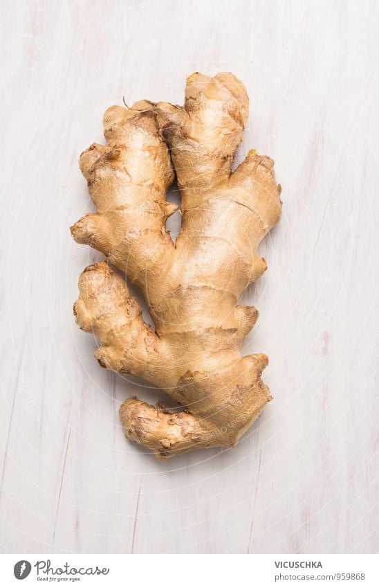 raw ginger root on a white wooden background Food Vegetable Herbs and spices Nutrition Organic produce Vegetarian diet Diet Lifestyle Healthy Eating
