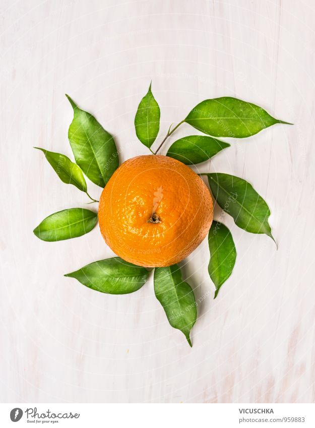 Orange fruit with green leaves on white wood Food Fruit Nutrition Organic produce Vegetarian diet Diet Juice Style Design Healthy Eating Life