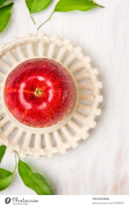Red apple with leaves in white plate. Food Fruit Apple Nutrition Breakfast Organic produce Vegetarian diet Diet Plate Bowl Style Design Healthy Eating Fitness