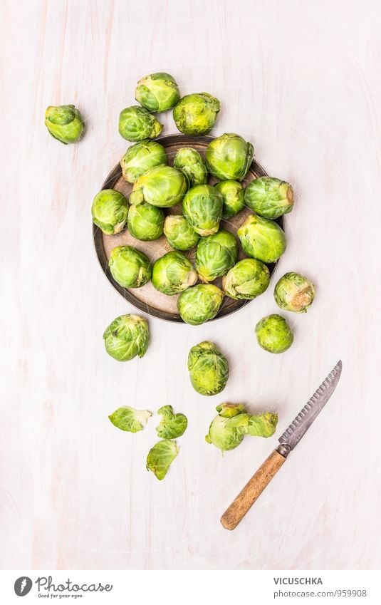 Brussels sprouts peeling, preparation for cooking Food Vegetable Nutrition Organic produce Vegetarian diet Diet Bowl Knives Lifestyle Style Design