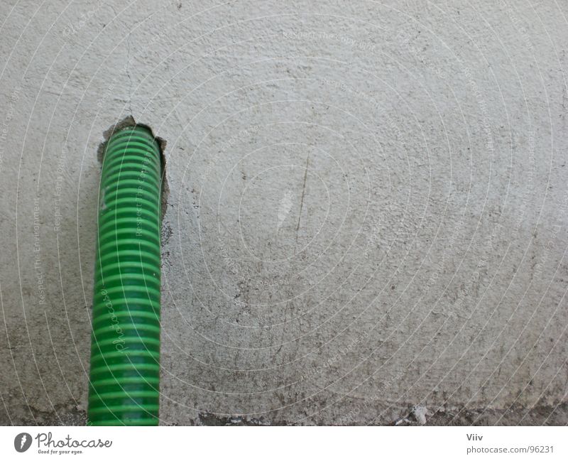 hose Hose Wall (building) Stripe Green White Dirty Plaster Garden hose Pattern Obscure Hollow Structures and shapes Colour