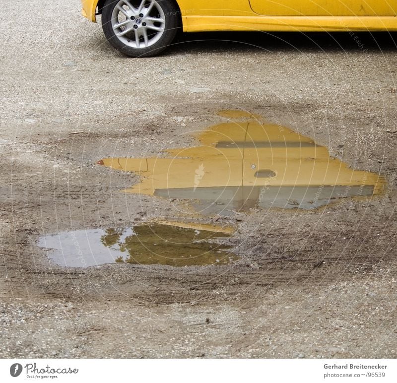 leasing Yellow Puddle Reflection Mirror image Mud Wheel rim Electrical equipment Technology Car Varnish Water Rain