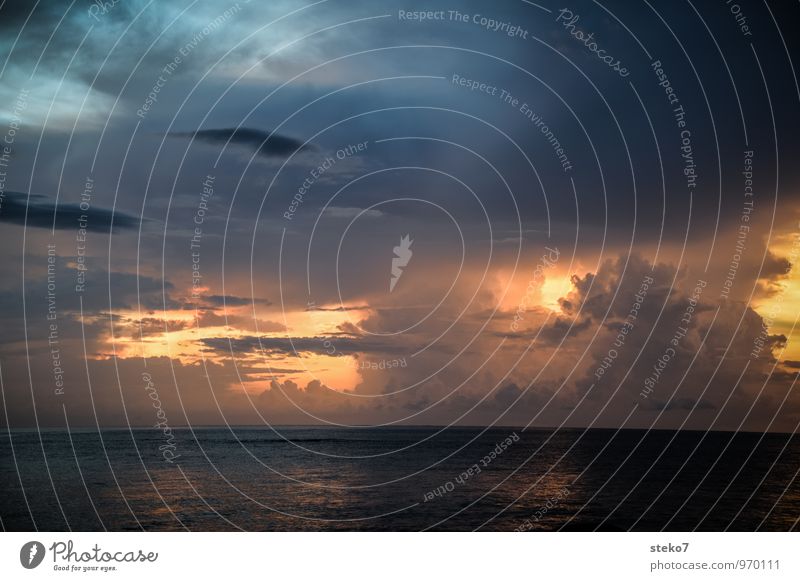 thunderstorm setting Storm clouds Horizon Ocean Andaman Sea Threat Dark Blue Gold Gray Exterior shot Deserted Copy Space top Copy Space bottom Evening Sunrise