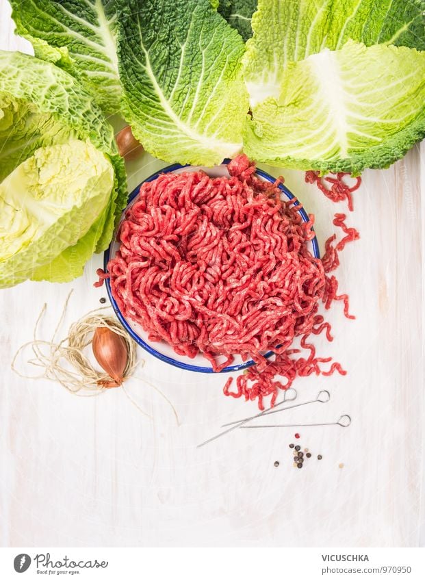 Raw minced meat and savoy cabbage cabbage leaves. Food Meat Vegetable Herbs and spices Nutrition Lunch Dinner Organic produce Diet Bowl Style Design