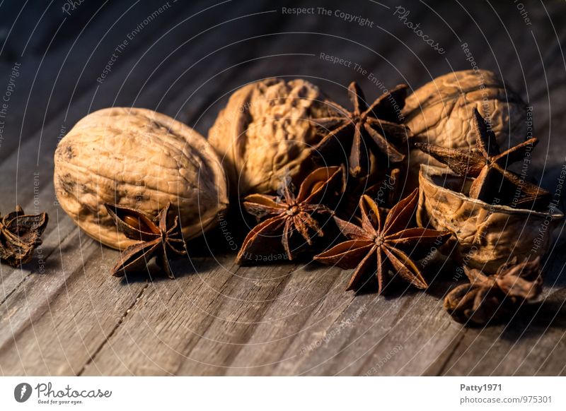 Star anise and walnuts Food Walnut Star aniseed Nutshell baking ingredients illicium verum Nutrition Christmas & Advent Fragrance Delicious Brown Moody
