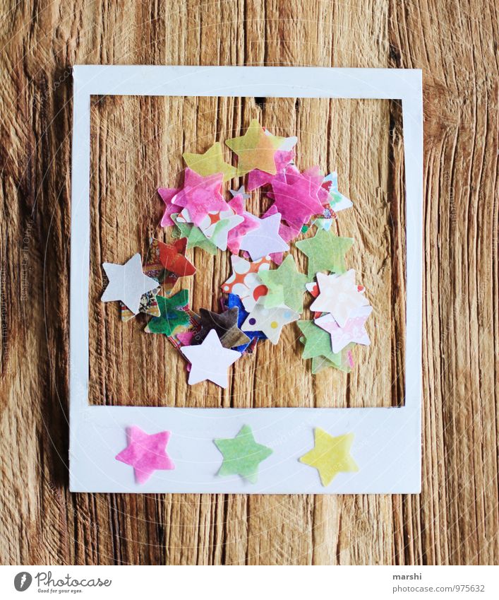 Polaroid with star motif Sign Digits and numbers Emotions Retro Frame Stars Star (Symbol) Christmas & Advent Wooden table Structures and shapes Beautiful