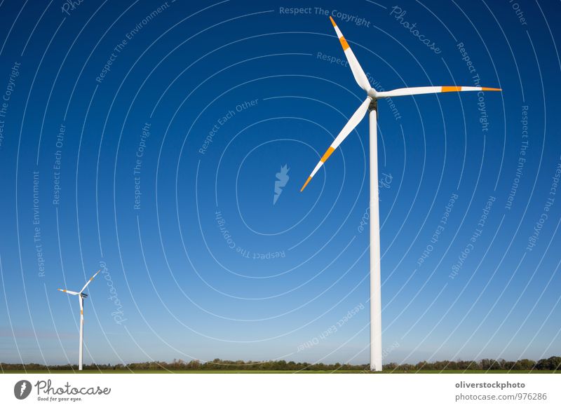 windmills Sun Technology Wind energy plant Environment Nature Landscape Sign Rotate Tall Sustainability Blue Green Red White Responsibility Innovative