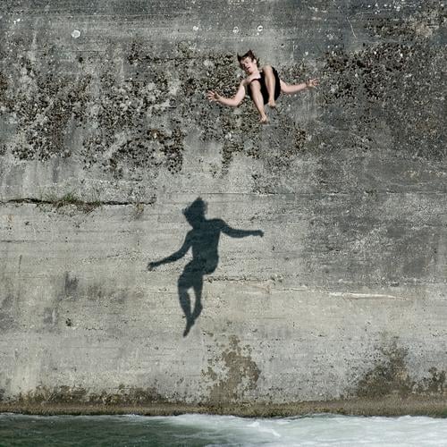 falling down II Jump Summer White crest Isar Body of water Bavaria Munich Together 2 Downward Wall (building) Wall (barrier) Dangerous Joy Water Blue Level