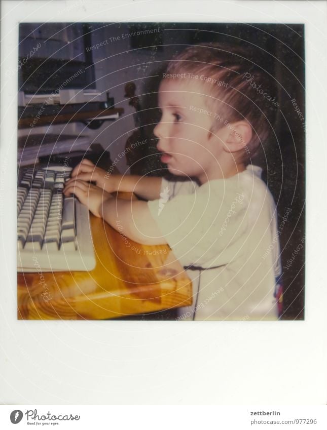 digital native Old Collection Photography Art gallery Polaroid Computer Child Toddler office Playing Computer games Digital Keyboard Head Table Watchfulness