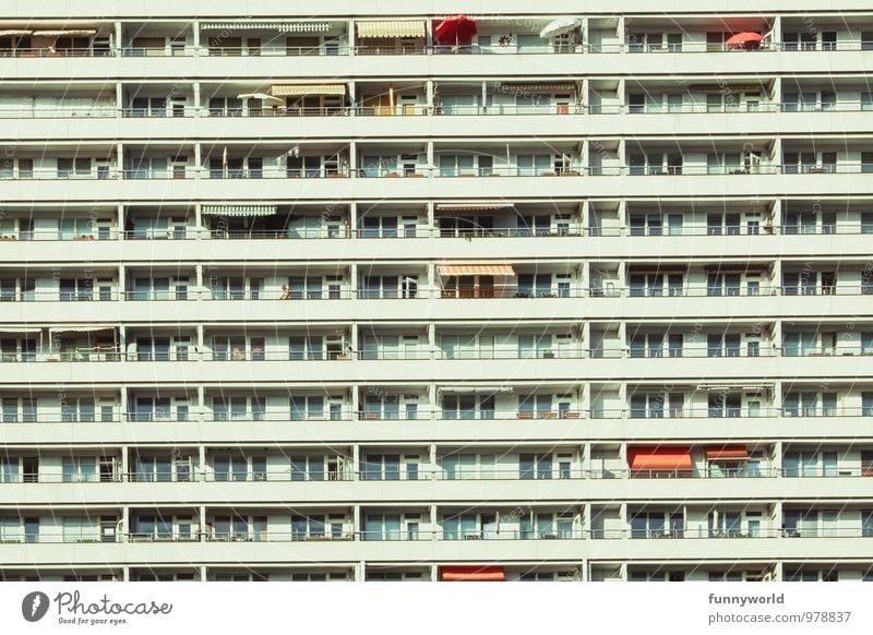 urban symmetry Berlin Capital city High-rise Manmade structures Building Architecture Facade Balcony Gloomy Town Together Loneliness Society Idyll Modern