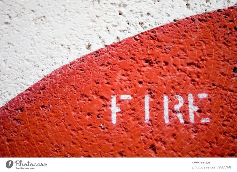 fire Art Exhibition Work of art Wall (barrier) Wall (building) Facade Sign Characters Signs and labeling Signage Warning sign Graffiti Line Communicate Hot Red