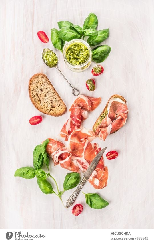 Parma ham with toast , basil pesto and tomatoes Food Meat Sausage Vegetable Lettuce Salad Bread Herbs and spices Cooking oil Nutrition Lunch Buffet Brunch