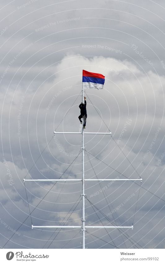 Russian sailor Man Flag Sailing Watercraft Dramatic Clouds Bad weather Flagpole Success Sky Seaman Climbing