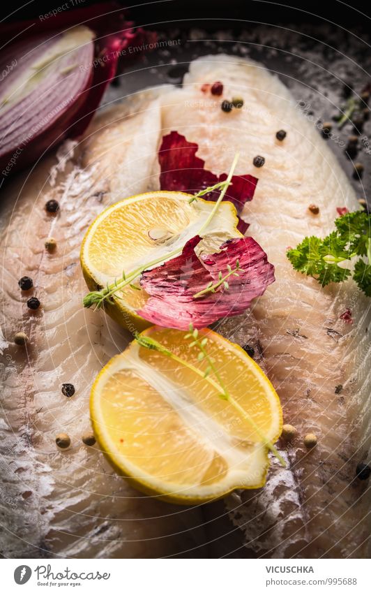 Lemon half on raw zander fish fillet Food Fish Fruit Herbs and spices Cooking oil Nutrition Lunch Dinner Organic produce Vegetarian diet Diet Style Design