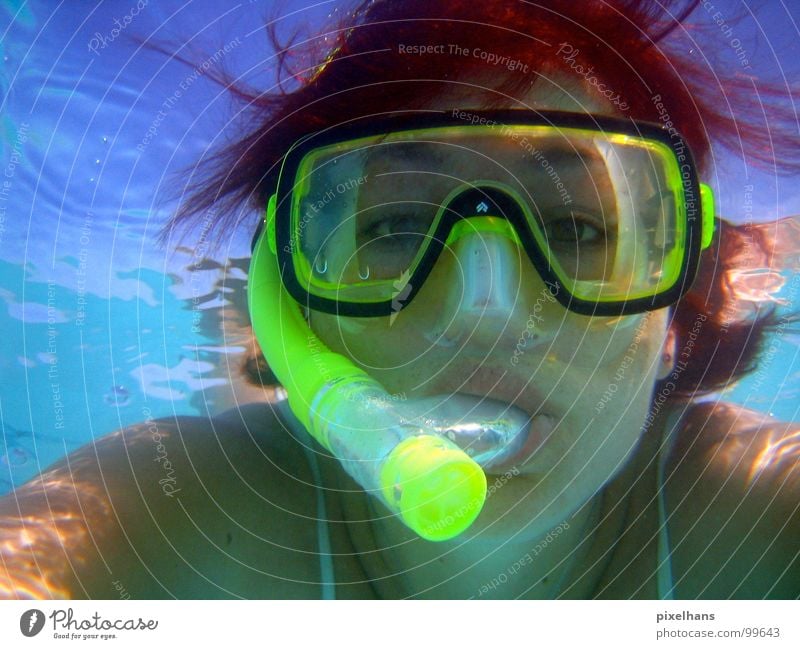 WHAT ARE YOU LOOKING AT????? Yellow Snorkeling Red-haired Mouthpiece Indian Ocean Air Breathe Woman Surface Reflection Light Aquatics Water Blue Transparent